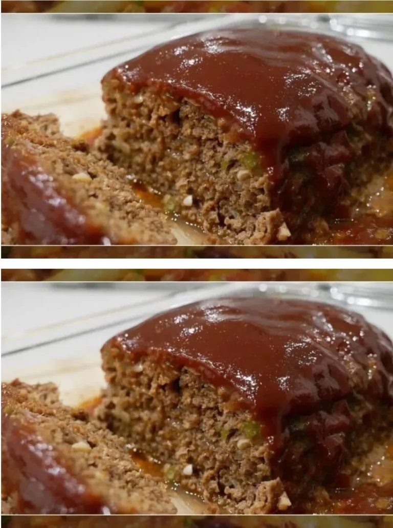 Homemade meatloaf served with mashed potatoes and green beans