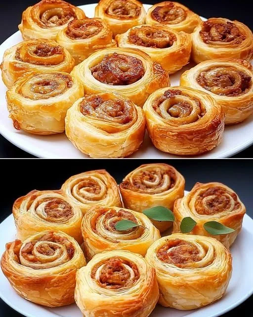 Golden puff pastry rolls filled with savory meat