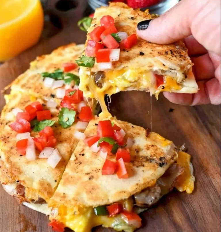 Delicious breakfast quesadilla with eggs, cheese, and vegetables