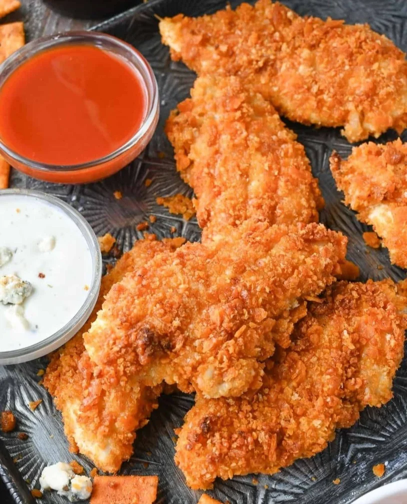 Delicious Buffalo Chicken Tenders served with dipping sauce