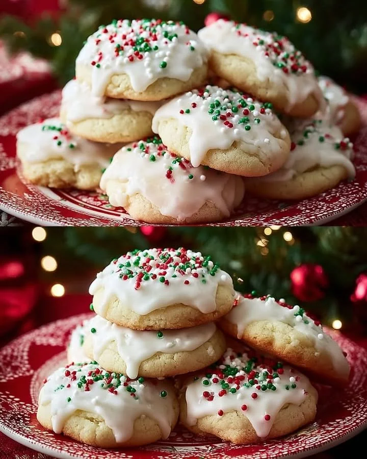 Assorted Christmas cookies decorated with icing and sprinkles on a festive plate.