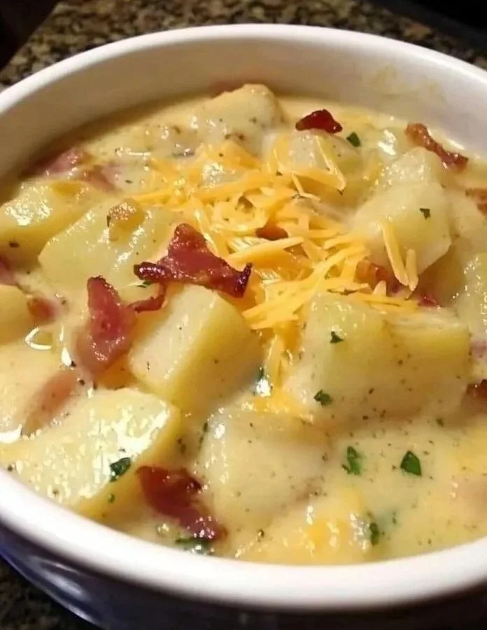 Delicious loaded potato soup topped with cheese, bacon, and green onions.