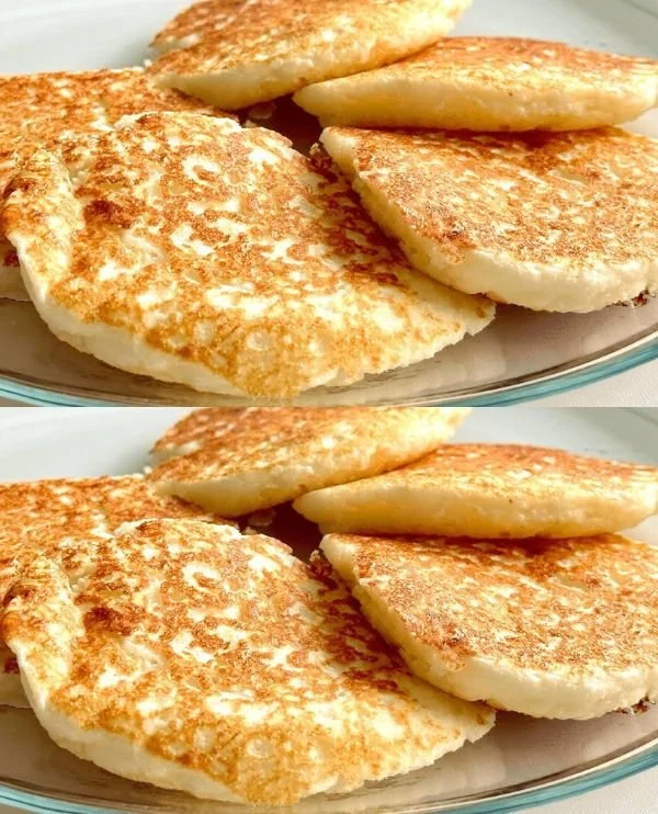 Flourless pancakes served with fresh fruit and syrup