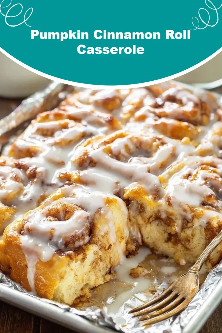 A delicious Pumpkin Cinnamon Roll Casserole topped with cream cheese icing.