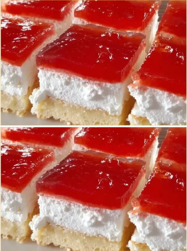 Delicious sponge cake topped with soft cream and colorful jelly