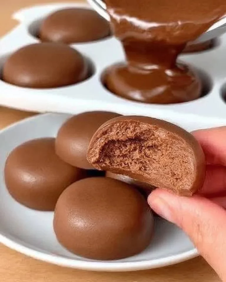 Delicious Coconut Chocolate Agar dessert served in a bowl with coconut flakes.
