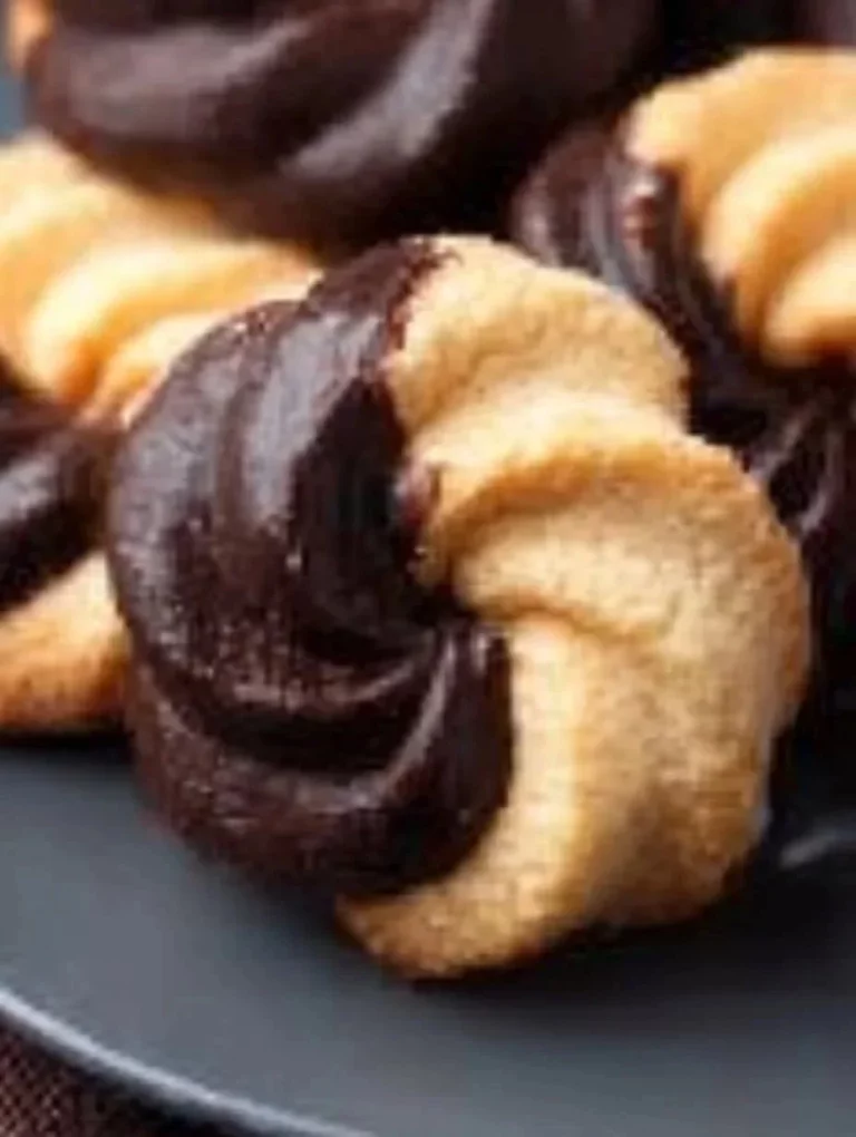 Delicious small butter pastries displayed on a plate.