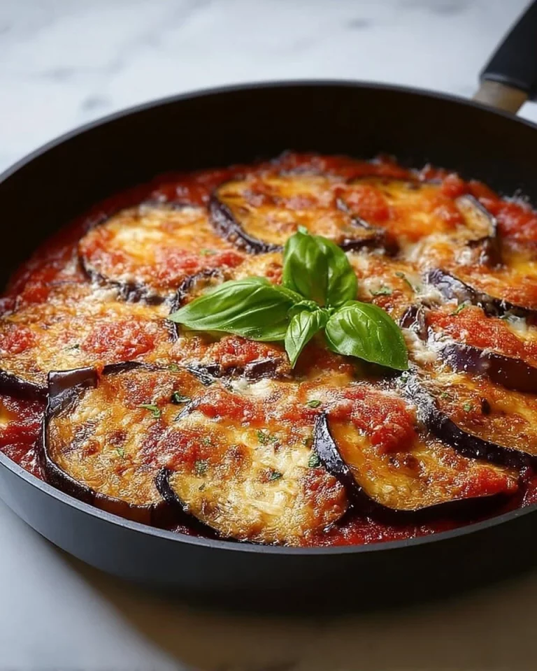 One-Pot Parmigiana dish served with layers of cheese and sauce.