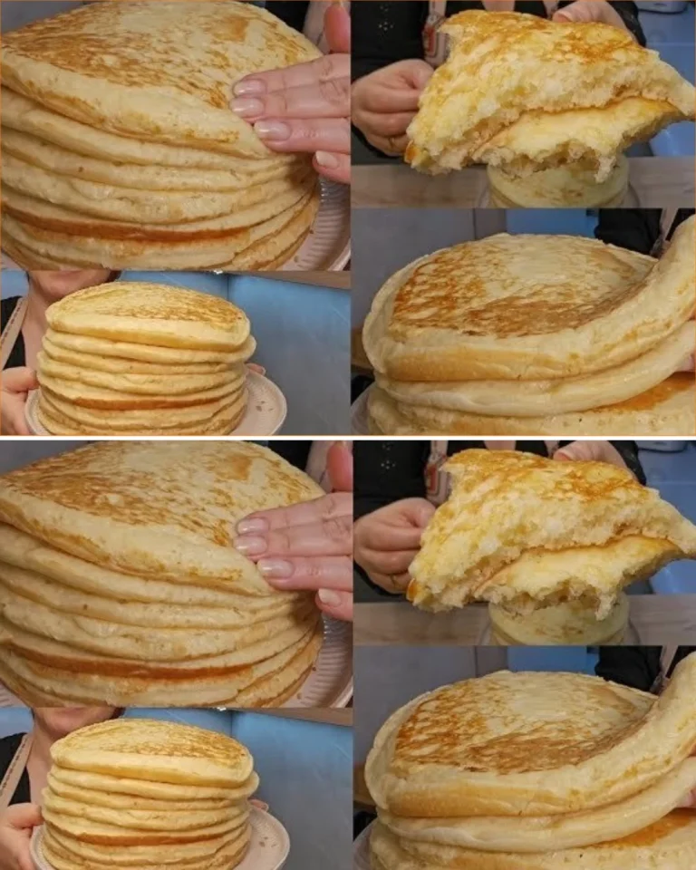 Stack of fluffy pancakes with syrup and berries on top