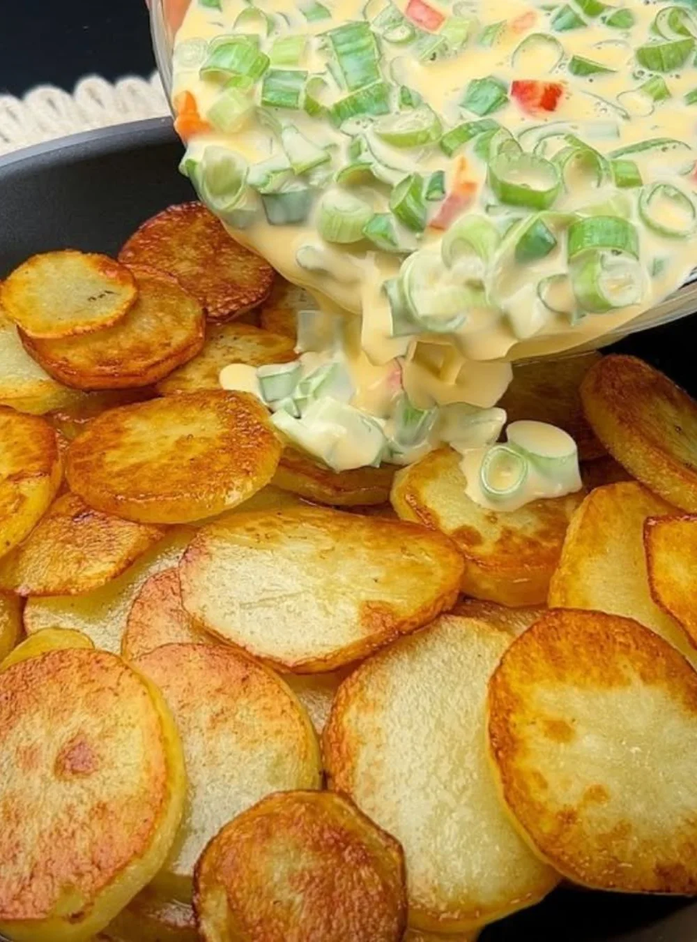 Golden Potato and Egg Skillet served in a skillet with fresh herbs