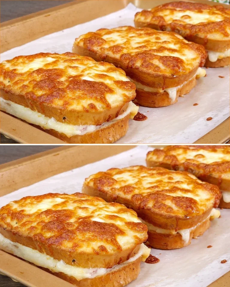 Delicious homemade breakfast sandwich with egg, cheese, and bacon on a toasted bun.