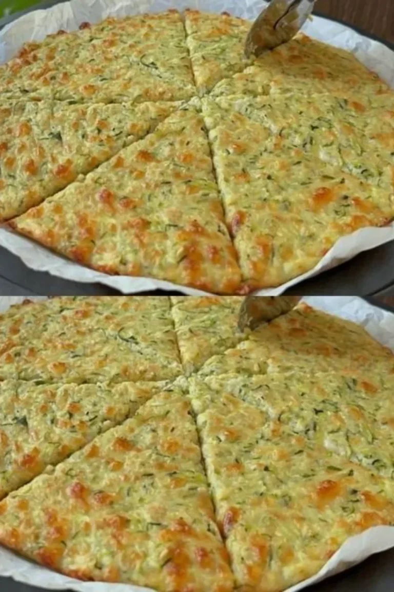 Homemade irresistible zucchini pizza topped with fresh ingredients.