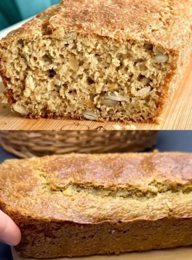 A loaf of healthy oatmeal bread made without flour or butter on a wooden table.