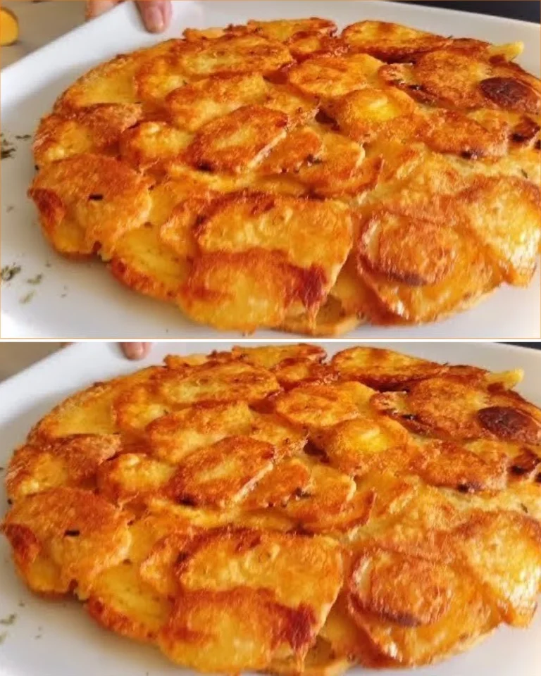 Delicious potato frittata served on a plate with herbs and spices.