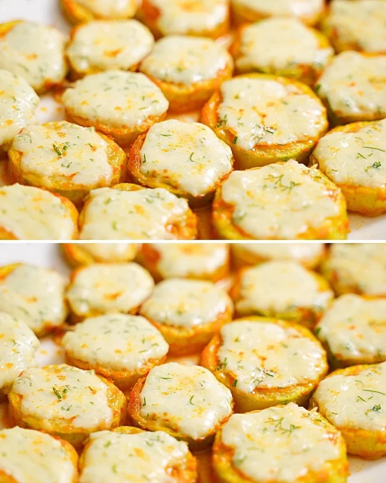 Baked zucchini slices seasoned and ready for a delicious oven dish