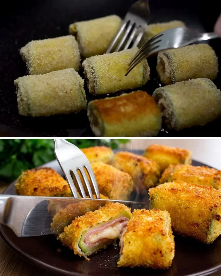 Delicious zucchini rolls filled with cheese and herbs on a wooden platter