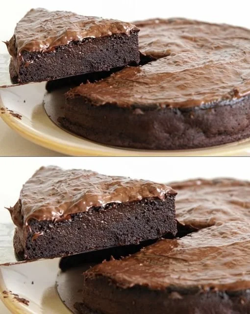 Slice of healthy chocolate cake made without sugar, flour, or butter