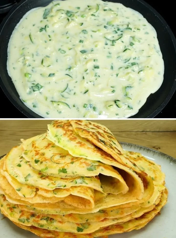 Grated zucchini and potato dish garnished with herbs, ready to serve.