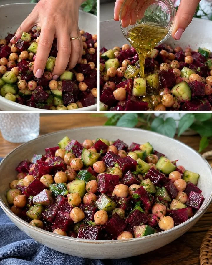 Colorful beets and chickpea salad with fresh greens and dressing