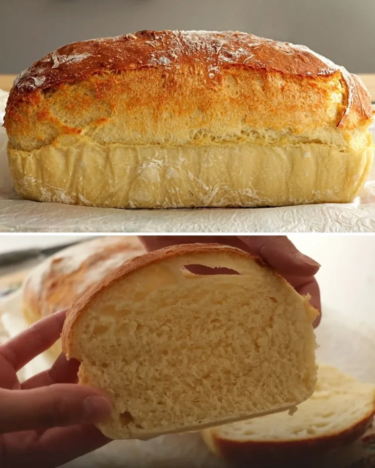 Freshly baked no-knead bread on a rustic wooden table.